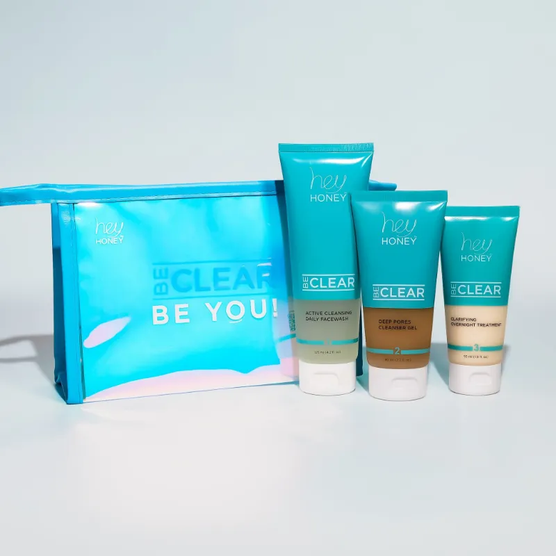 Hey Honey BE CLEAR 3 Step Acne Control Routine set with three products and free cosmetic bag