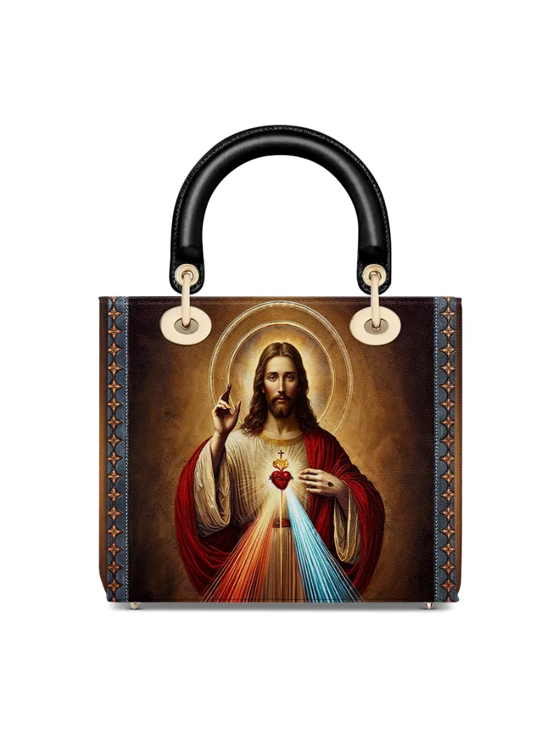 Catholight A Testament of Grace and Compassion Lady Leather Bag with Divine Mercy artwork