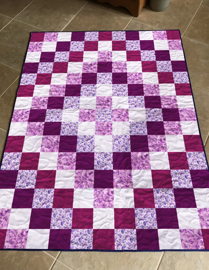Boho Blanket Butterfly Kisses Quilt Pattern, a bold graphic butterfly quilt design with layered textures