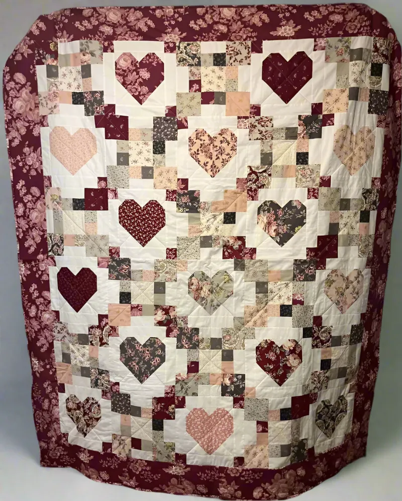 Boho Blanket Heartstrings Harmony Quilt Pattern product photo showing the finished quilt