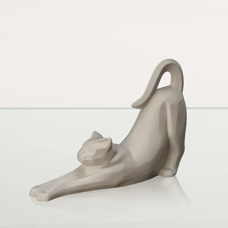 Pulvis Art Urns Grace Cat Cremation Urn in white matte ceramic showing stretching cat sculpture