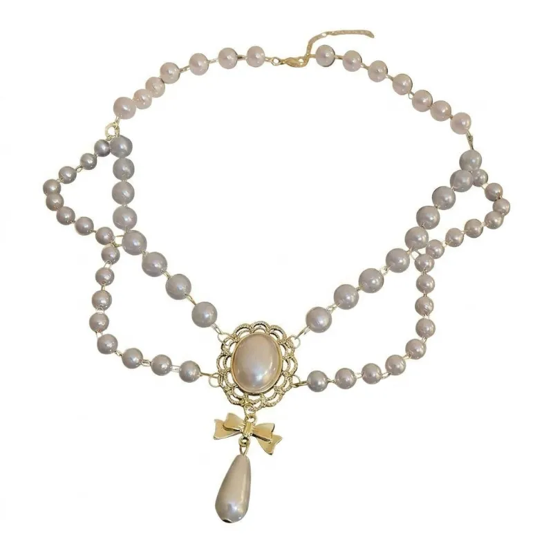 Cottagecore Clothes Ethereal Cameo Bow Drop Necklace with double pearl strands and gold cameo