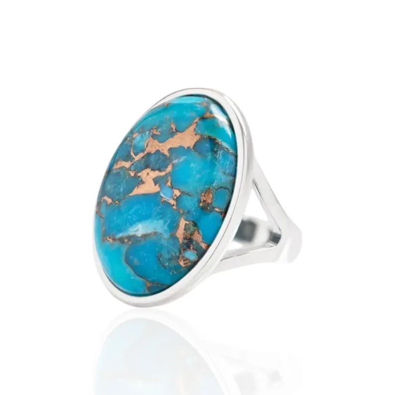 DORSYA Nomi Silver Cocktail Ring with Copper Turquoise showing oval blue-green gemstone with golden flecks in sterling silver setting