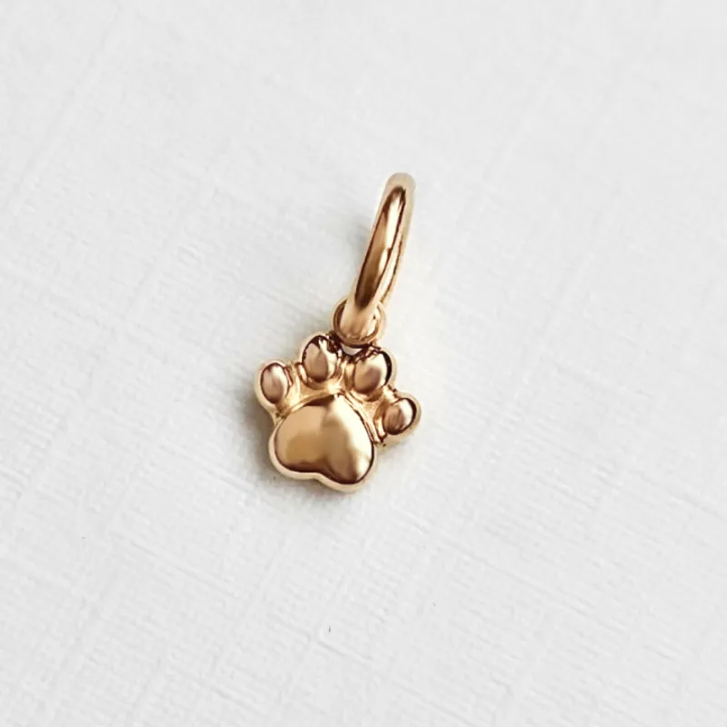 DORSYA Paw Paw Gold Charm showing small 5mm paw print in 18K gold plated stainless steel