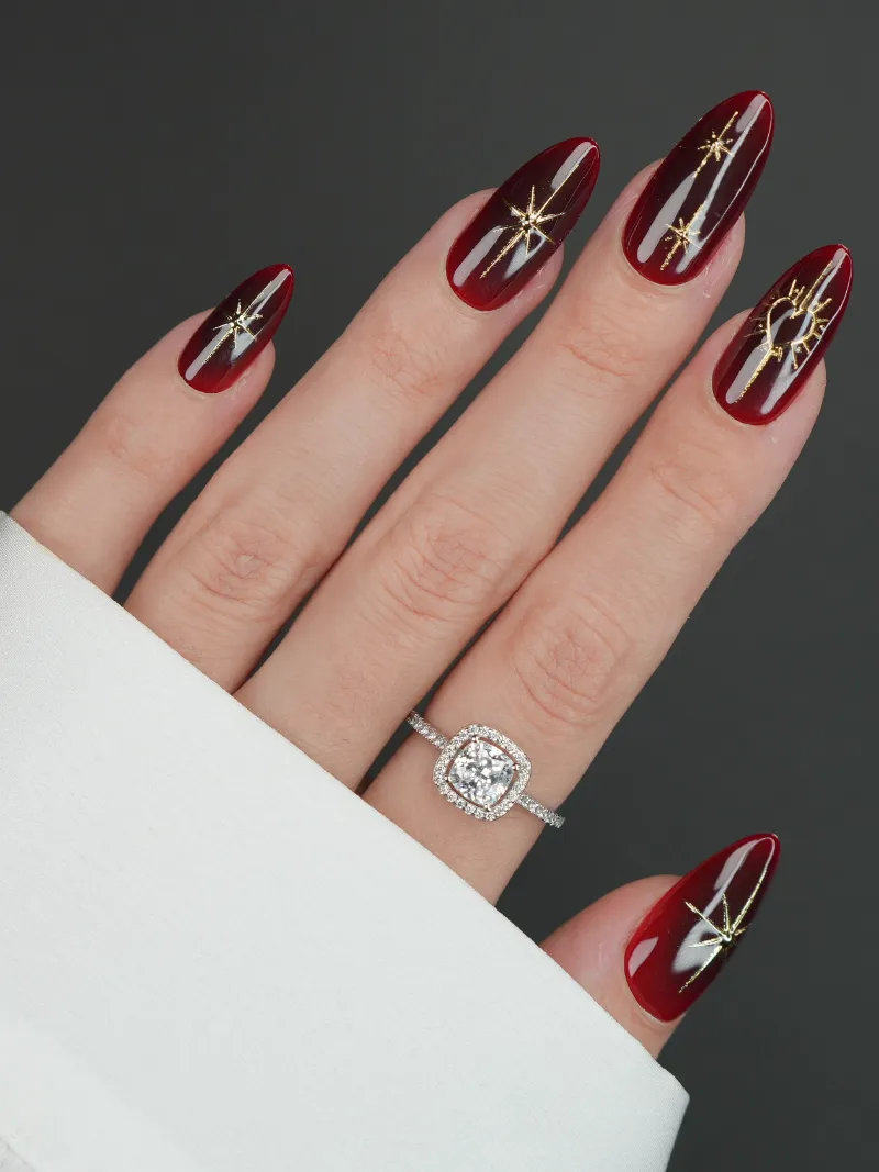 Roxy Nails Paris Enigma press on nails in deep red with gold celestial design