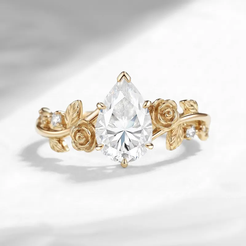 Starlandus 'A Rose Is A Rose Is A Rose' Nature Inspired Pear Cut Moissanite Romantic Rose Flower Engagement Ring with vine band