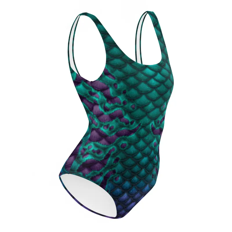 Sereia Guardiã Obscura One-Piece Swimsuit shown on a model by the pool