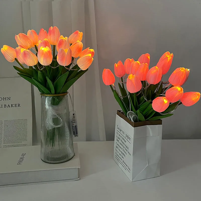 Juwas Beautiful Tulip Night Light showing pink battery operated garden bulbs on grass.