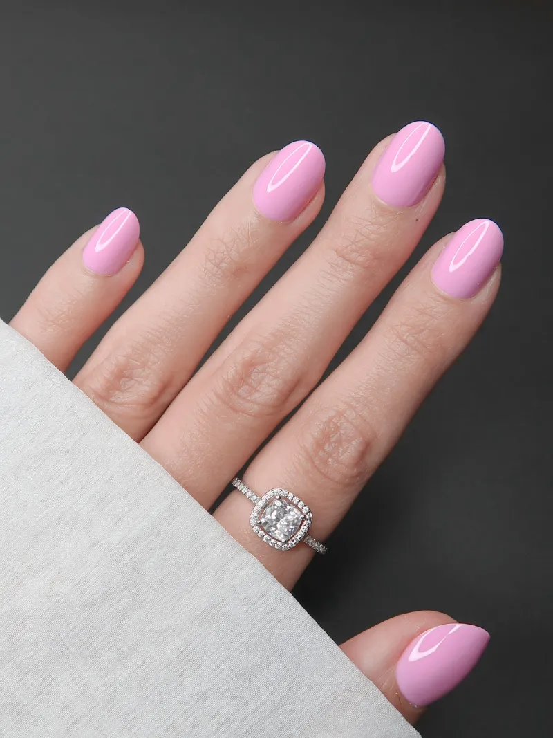 Roxy Nails Paris Camellia press-on nails in cool pastel pink with round tips and glossy finish