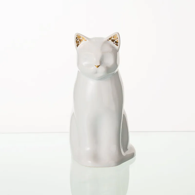Pulvis Art Urns Meow Pet Urn for Cat in white ceramic with golden ear and snout accents