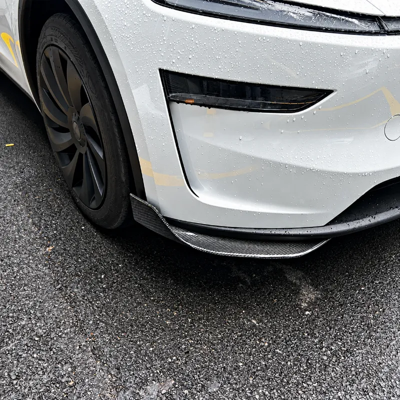 Tesstudio Carbon Fiber Front Bumper Corner Trim for Tesla Model Y Juniper showing carbon fiber accent at outer bumper edge
