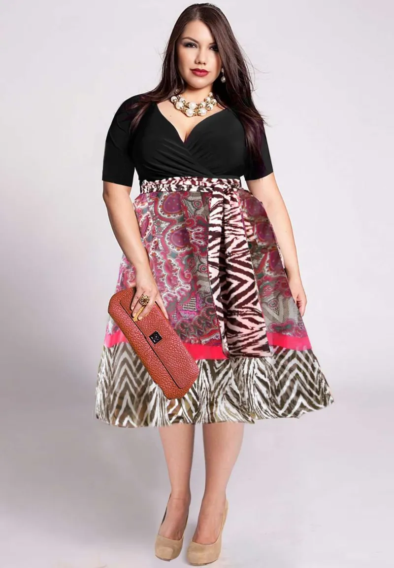 IGIGI Adelle Plus Size Dress in Black showing a chiffon flared cocktail dress with empire waist