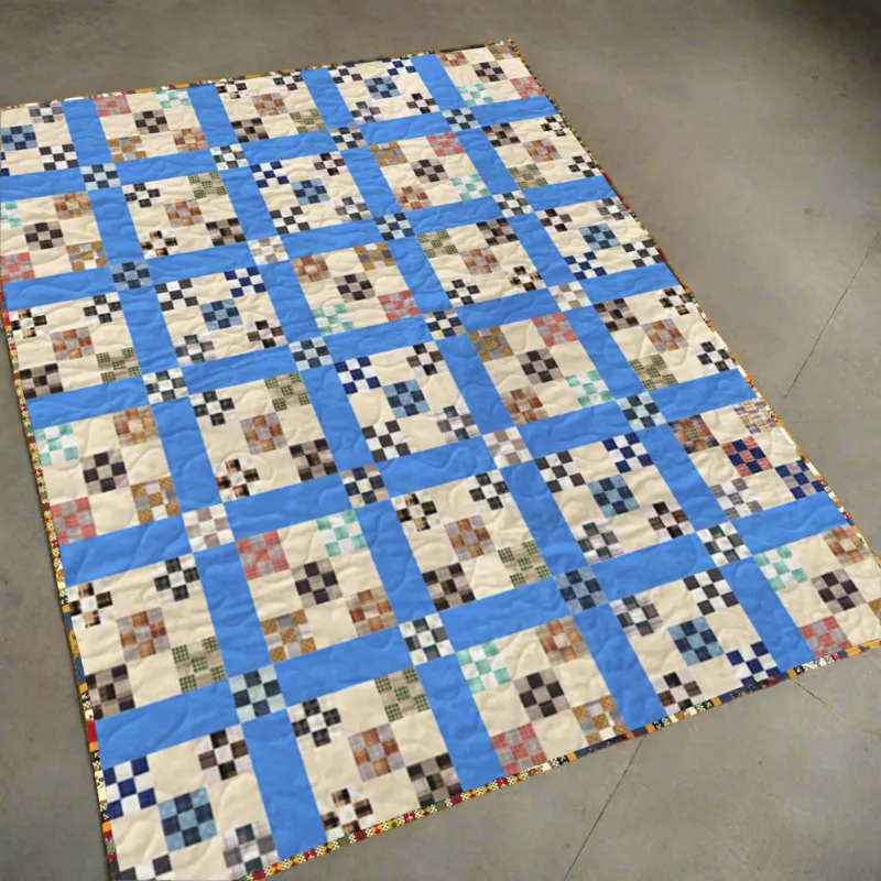 Boho Blanket Memories in Squares Quilt Pattern, a quilt with layered square blocks in mixed prints and solids