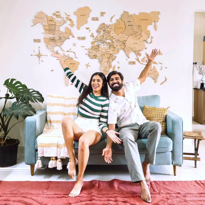 Enjoy The Wood 3D Wooden World Map Gold showing layered continents in natural wood with gold finish