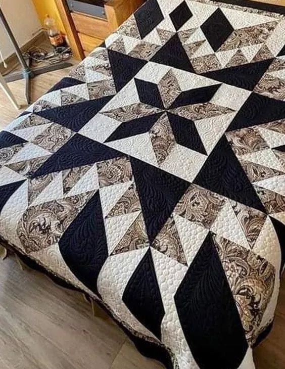 Boho Blanket Midnight Starburst Quilt Pattern, showing a bold starburst design for king, queen, and full beds
