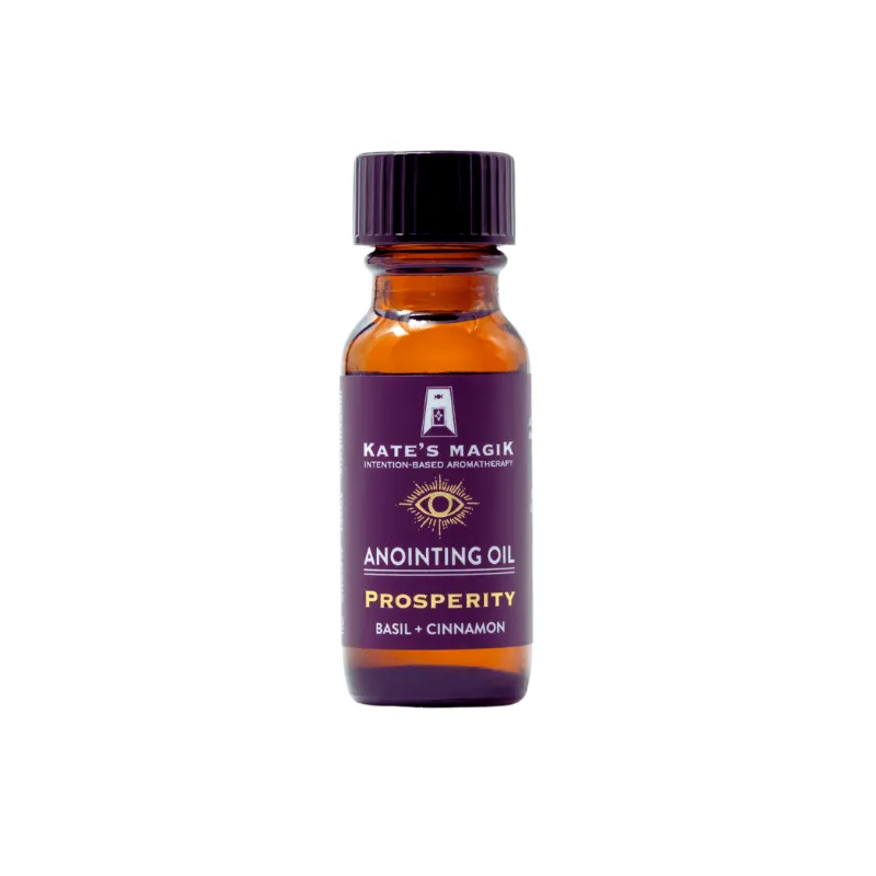 Kates Magik Prosperity Abundance Momentum Anointing Oil bottle with golden botanical blend
