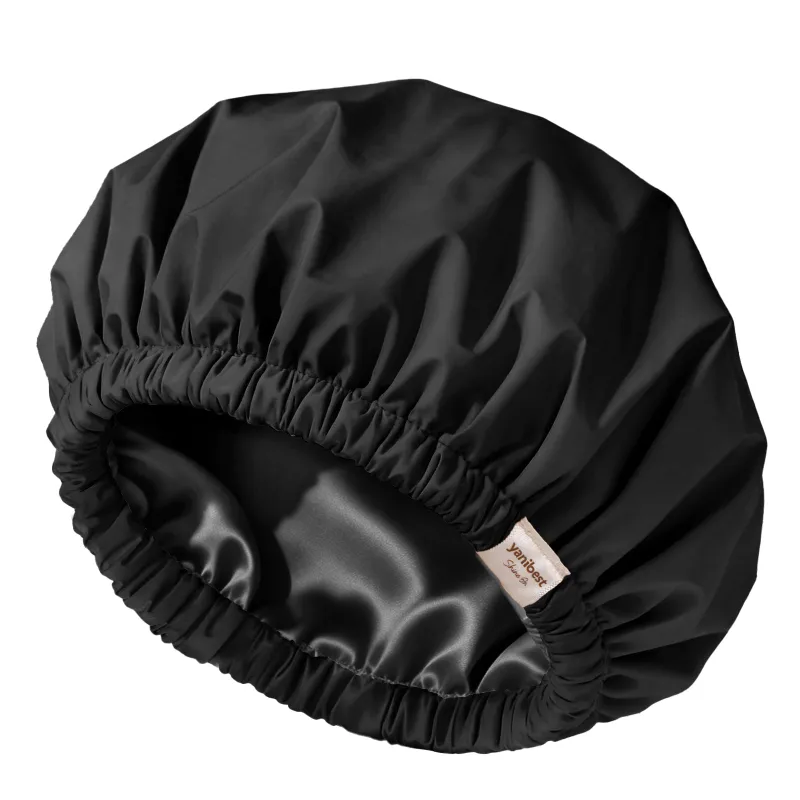 Yanibest Butter Satin Lined Waterproof Shower Cap in black, elastic edge shown
