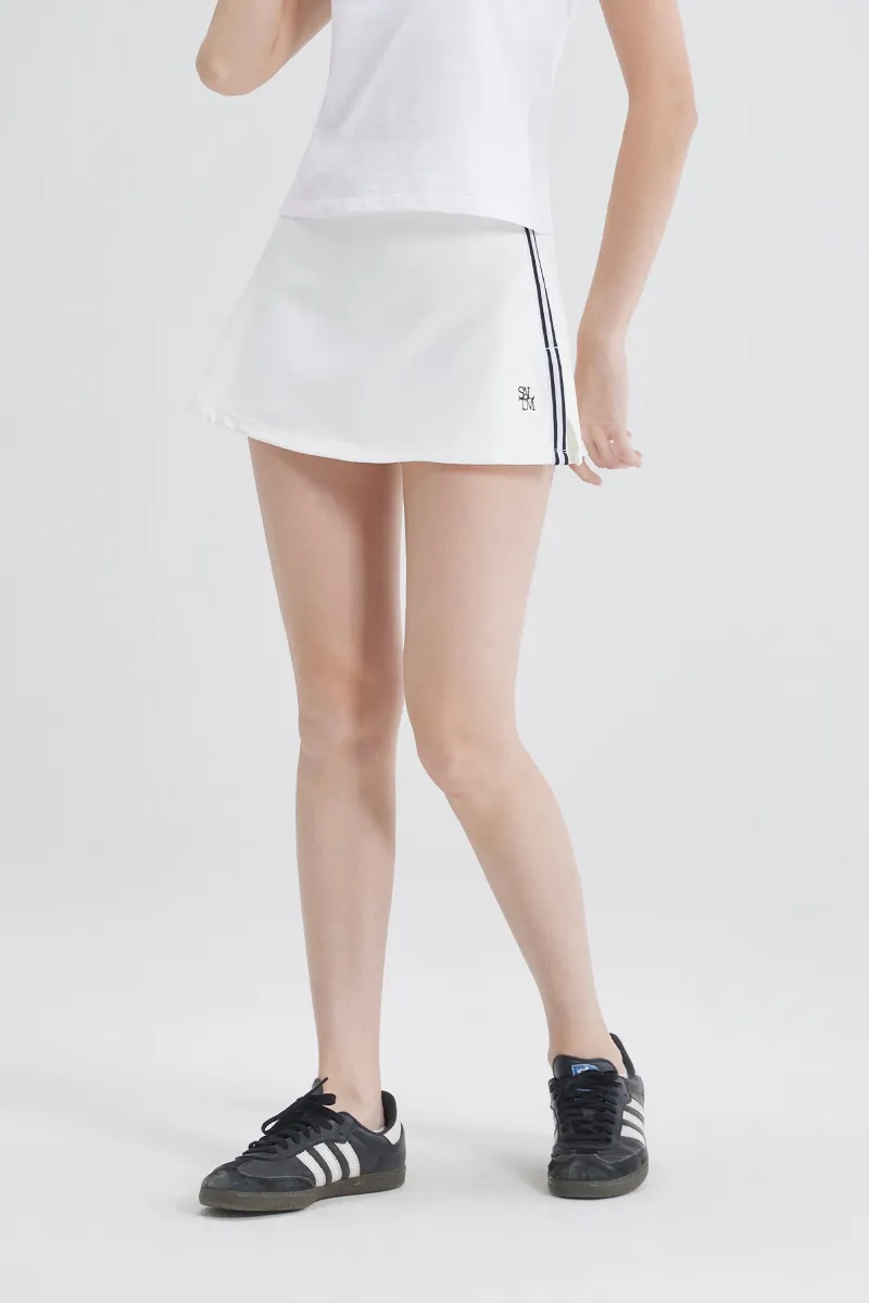 SALTUM Contrast Side Stripe Slit Skirt in athletic fabric with side stripe detail