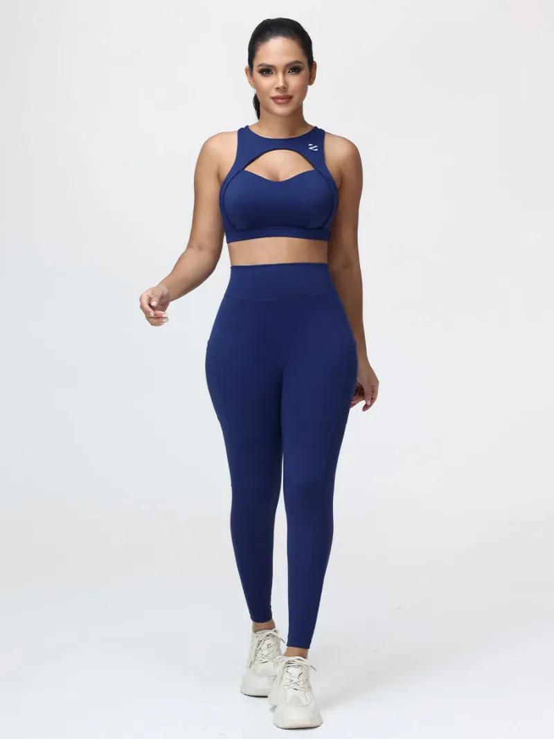 Zuluzenith Women's High-Support Gym Set with Racerback Sports Bra and V-Back Leggings in cranberry red, front view showing cut-out bra and V