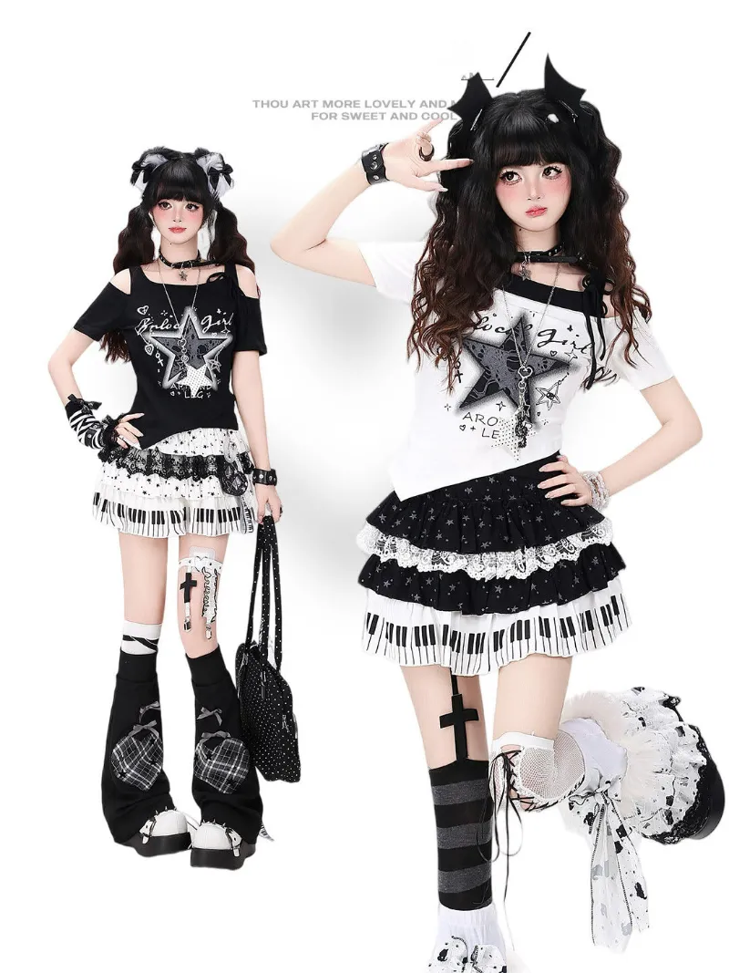 Juwas Black White Star Graphic Cold Shoulder T Shirt showing the black top with white star motifs and cutout shoulders.