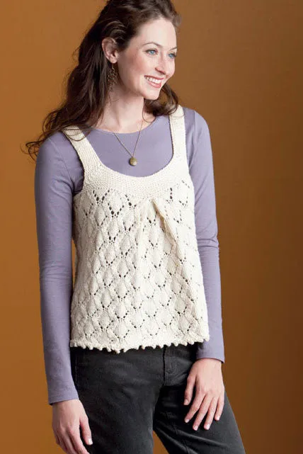 Kristen TenDyke Joy Lace Tunic knitting pattern showing a sleeveless lace top in cream