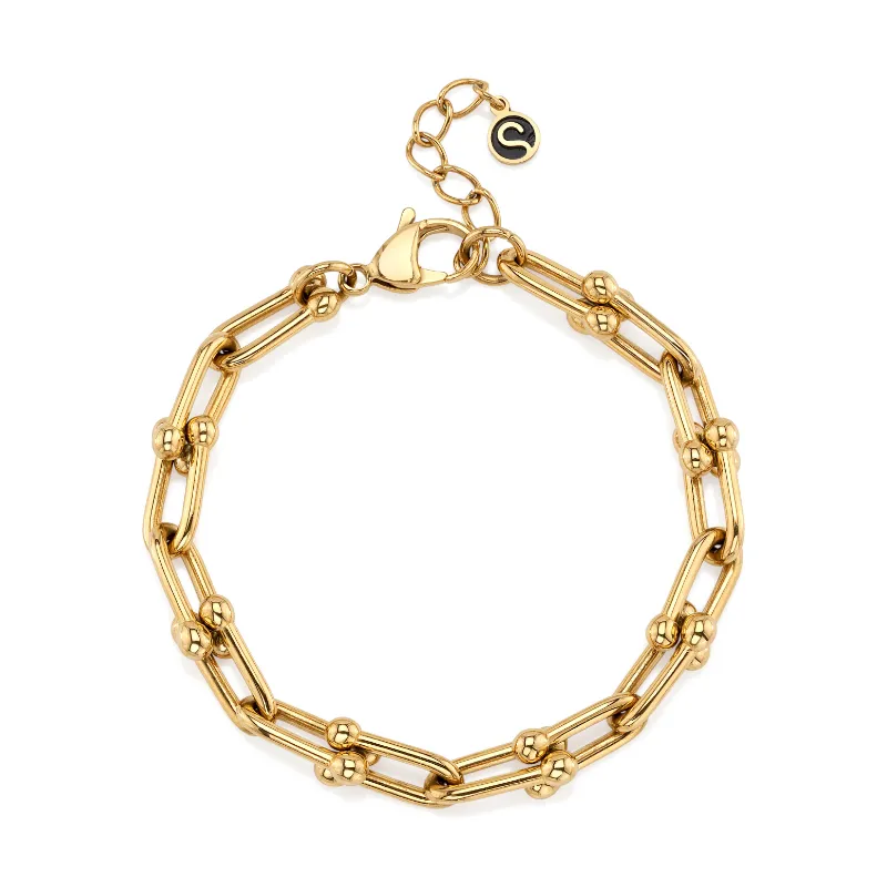 Sleek Fit Jewelry Nexus Bracelet in gold, a Jax link chain bracelet with a clear Swarovski crystal