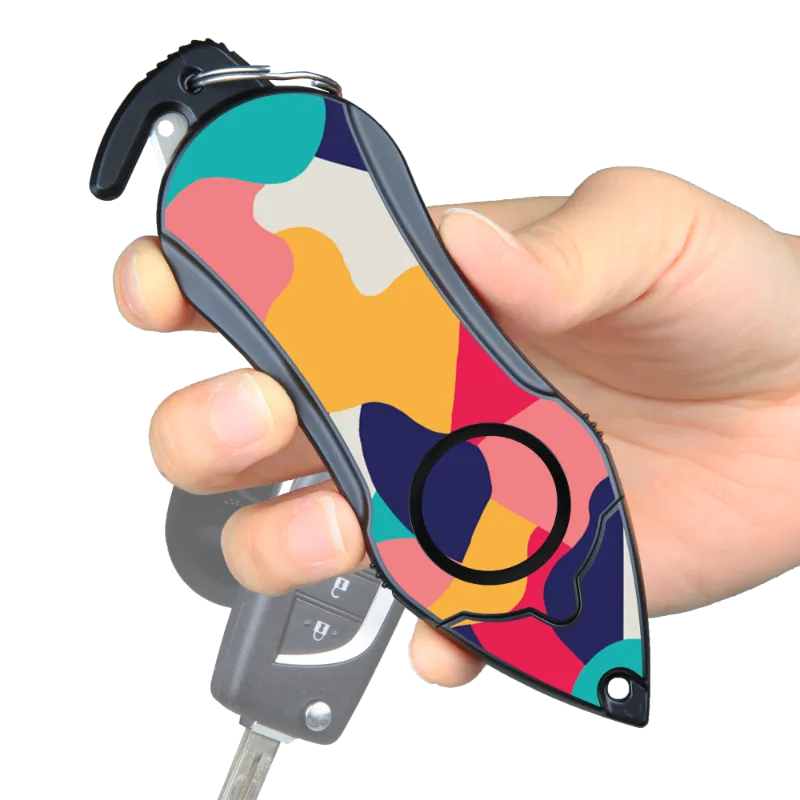 The Stinger Tools Stinger Personal Safety Alarm Keychain Emergency Tool in Colorful with siren alarm, seat belt cutter, and glass breaker