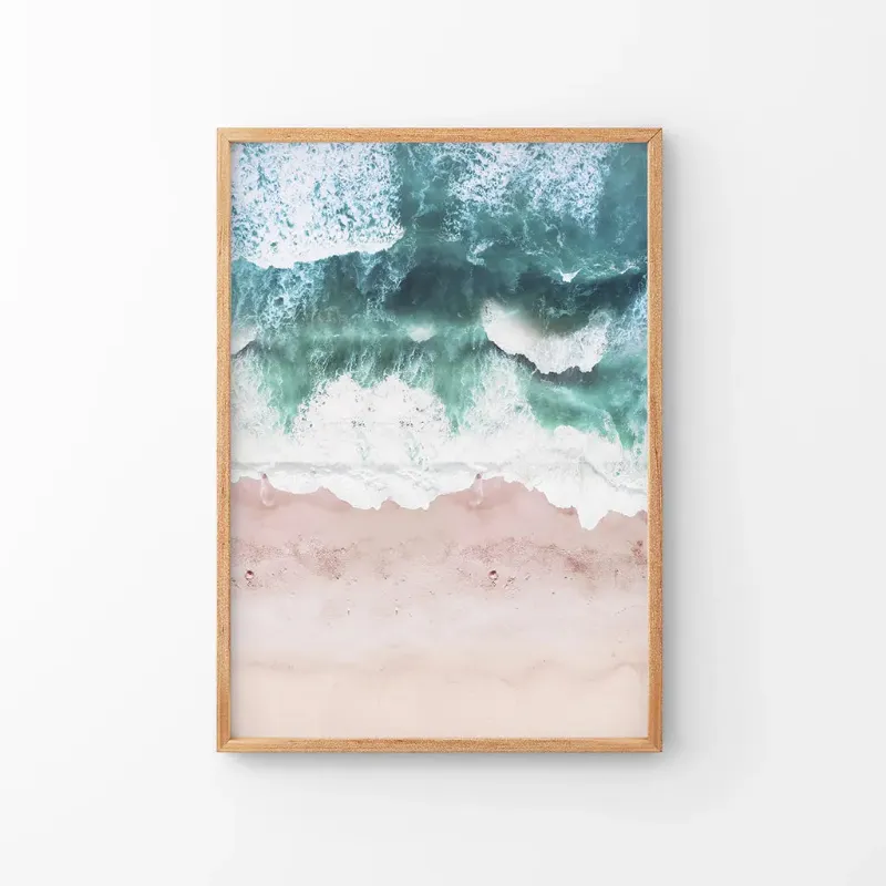 Wall Art Set Aerial Coastal Ocean Wall Decor. Pink Beach, Blue Waves showing an aerial view of pink beach and blue ocean waves