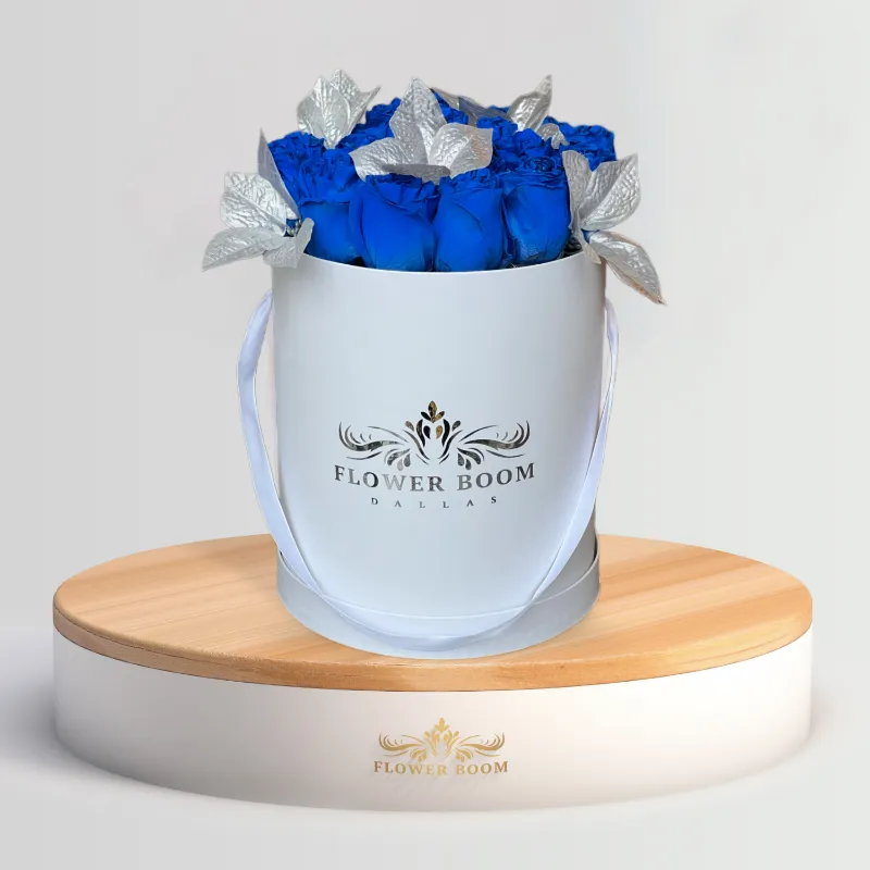 Flower Boom Dallas 2 Dozen Blue Roses And Silver Poinsettias in decorative flower box