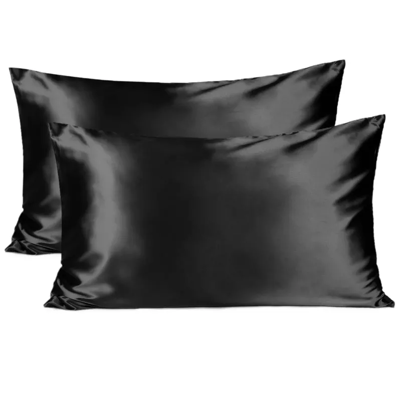 Yanibest Butter Satin Pillowcases 2 Pack Set in immersive black on a pillow