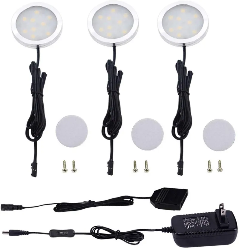 AIBOO Under Cabinet LED Lights Kit 3 Packs Slim Aluminum Puck Lights, three round puck lights on a counter