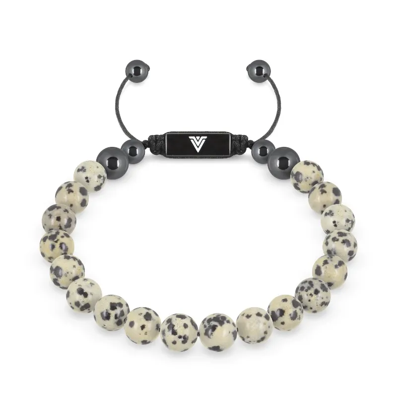 VOLTLIN Dalmatian Jasper Shambala Bracelet on a black suede pouch showing natural stone beads