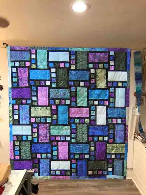 Boho Blanket Freeze Frame Quilt Pattern photo showing quilts in baby, twin, and queen sizes