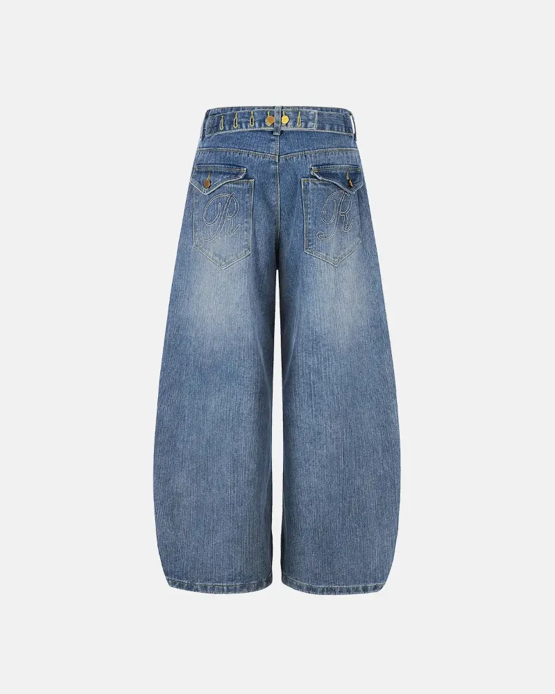 INFLATION Cinch Back Washed Bamboo Weave Baggy Jeans in vintage washed blue with Paris-style buckle waist detail