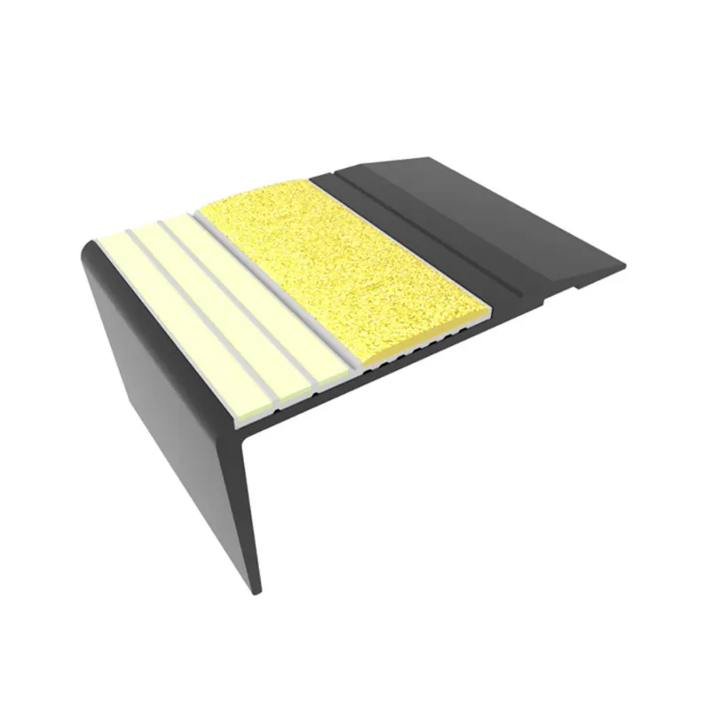 ComposiGrip Ecoglo F4251 Photoluminescent 2.7 Inch Black Anodized Flat Stair Nosing with Yellow Insert installed on stair edge