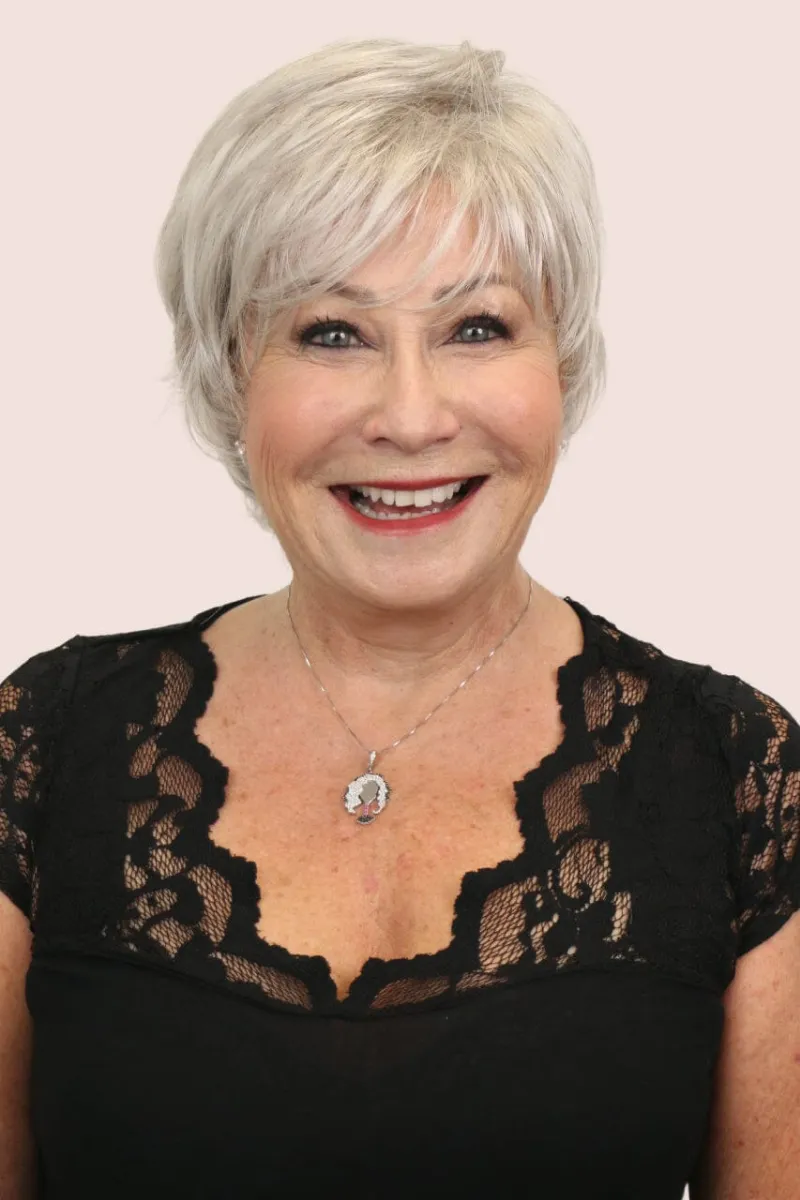 Godiva's Secret Wigs Kim short wig in Moonlight with textured layers and open-weft cap
