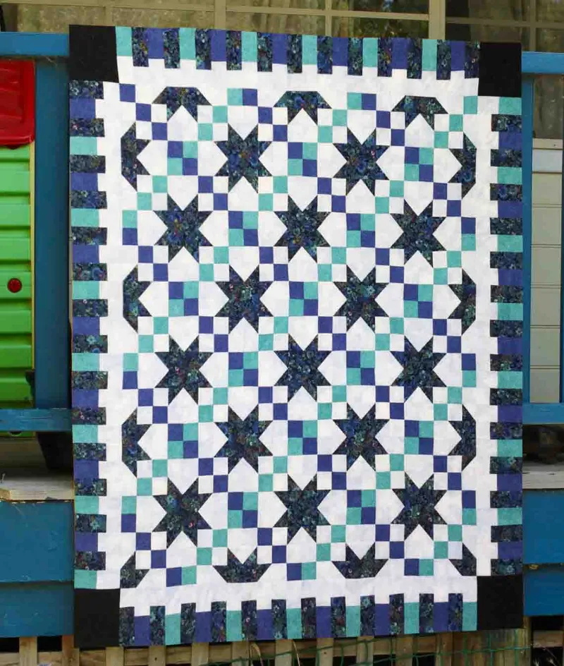 Boho Blanket Buttercup Quilt Pattern, a cheerful quilt design layered with texture and colour