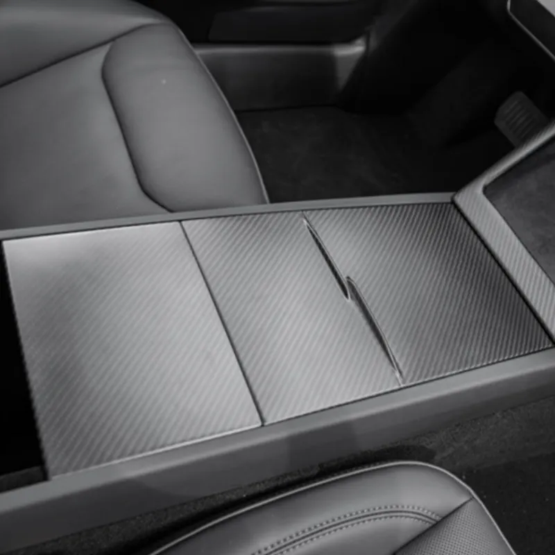 Tesstudio Carbon Fiber Center Console Overlays Gen 2 for Model Y L showing molded twill weave finish on center console push handle