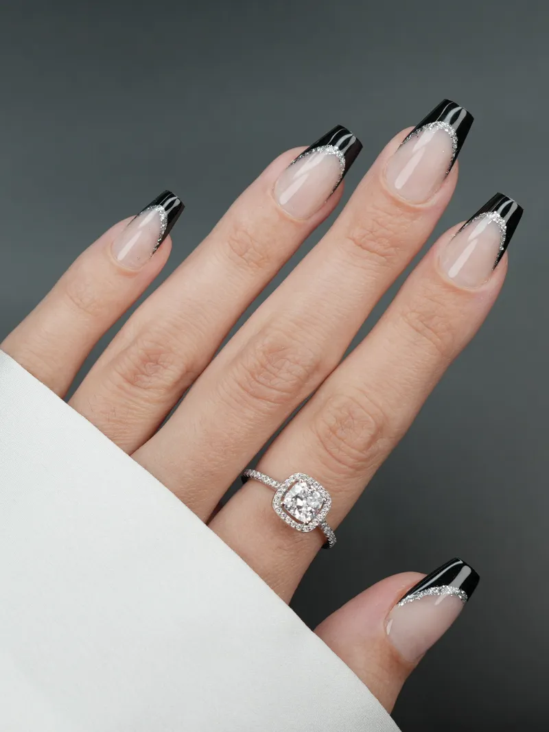 Roxy Nails Paris Sophisticated press on nails with black french tips and silver glitter