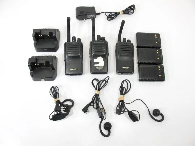 ZeereeZ 3 Vertex Bearcom BC95 two way radios and accessories on a table