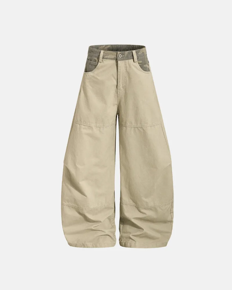 INFLATION Camo Patchwork Barrel Pants in washed cotton twill with wide leg silhouette and camo panel details
