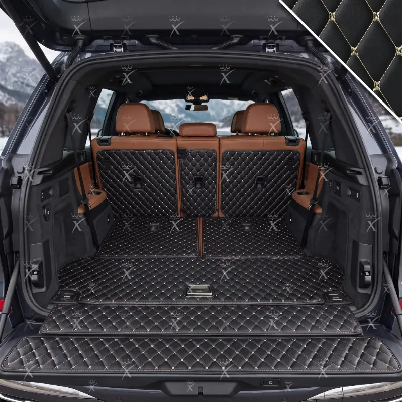 Luxus Car Mats XtendFit trunk mat in black with beige stitching shown fitted in a cargo area