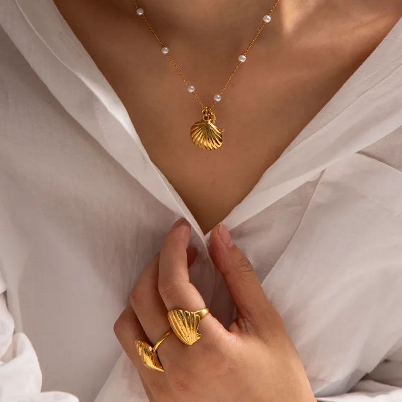 FabuLove EleganceShell Necklace featuring a shell-inspired pendant on a chain