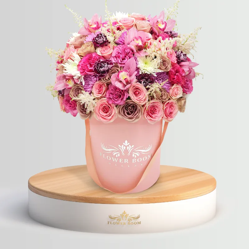Flower Boom Dallas Pinkie Flowers arrangement with pink roses, orchids, and purple chrysanthemums in a vase