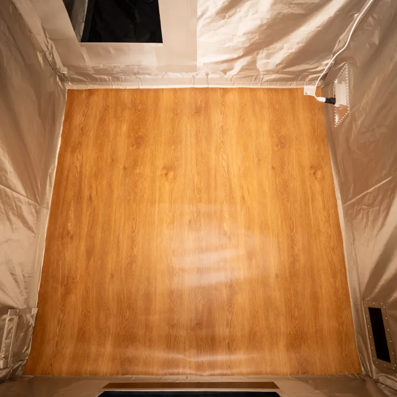 MOS Equipment Mission Darkness ErgoLayer Tent Flooring with woodgrain vinyl surface