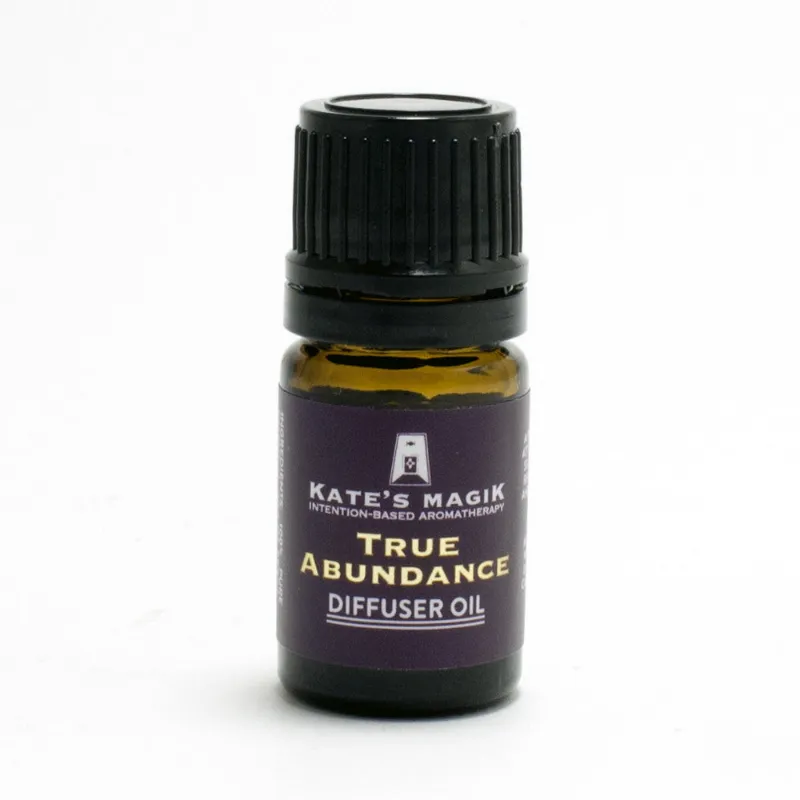 Kates Magik True Abundance diffuser oil bottle with bergamot and cinnamon blend