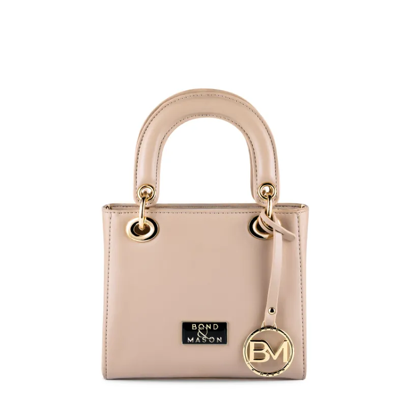 Bond & Mason The Esmé Handbag (Beige) showing a beige vegan leather handbag