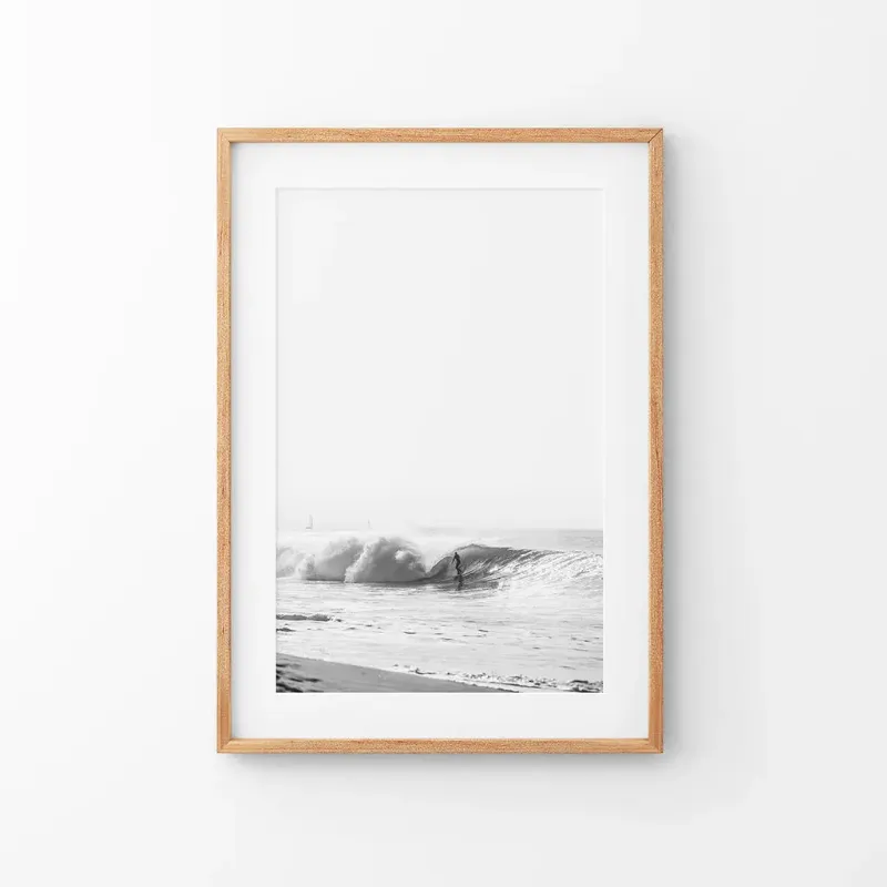 Wall Art Set Black White Boho Tropical Wall Decor. Surfer, Waves poster on a wall