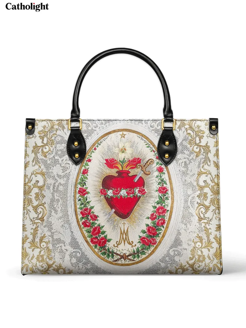 Catholight Immaculate Heart of Mary Elegance Leather Bag showing sacred heart motif with roses and gold filigree on white lace background