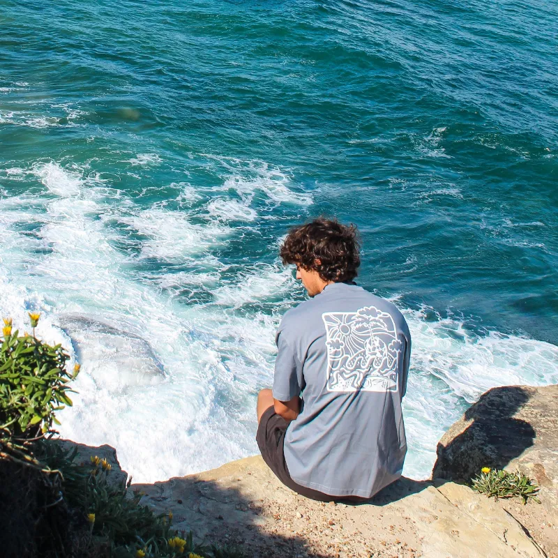 LivingForALivin Loose Sun Dance Tee showing a slouchy loose-fit t-shirt with sun dance graphic